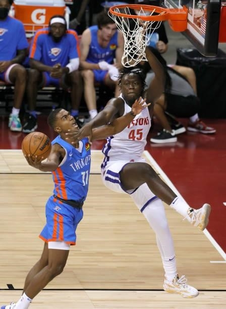 Sekou Doumbouya of the Detroit Pistons fouls Theo Maledon of the Oklahoma City Thunder during the 2021 NBA Summer League at the Thomas & Mack Center...