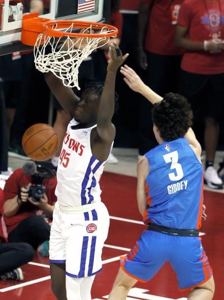 Sekou Doumbouya of the Detroit Pistons dunks against Josh Giddey of the Oklahoma City Thunder during the 2021 NBA Summer League at the Thomas & Mack...