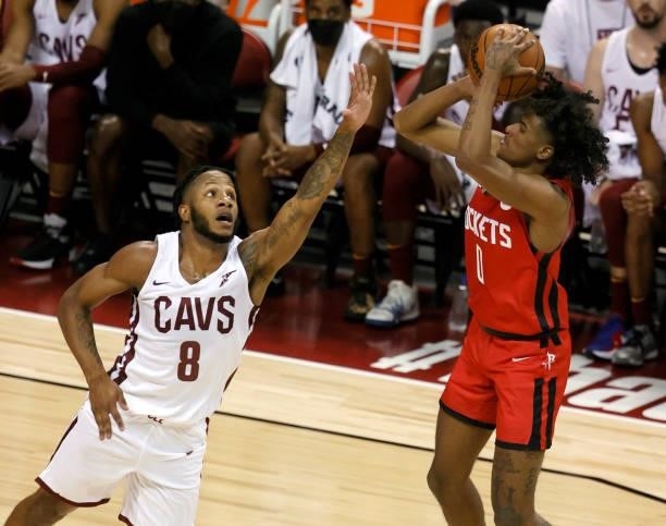 Jalen Green of the Houston Rockets shoots against Lamar Stevens of the Cleveland Cavaliers during the 2021 NBA Summer League at the Thomas & Mack...