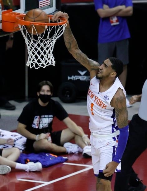 Obi Toppin of the New York Knicks dunks against the Toronto Raptors during the 2021 NBA Summer League at the Thomas & Mack Center on August 8, 2021...
