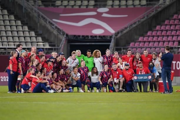 The USWNT pose for a photo after a game between Australia and USWNT at Kashima Soccer Stadium on August 5, 2021 in Kashima, Japan.