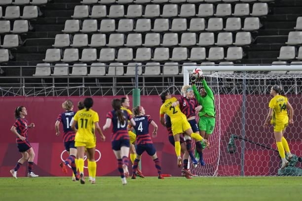 Adrianna Franch of the United States make a save as Sam Kerr of Australia goes for the header during a game between Australia and USWNT at Kashima...