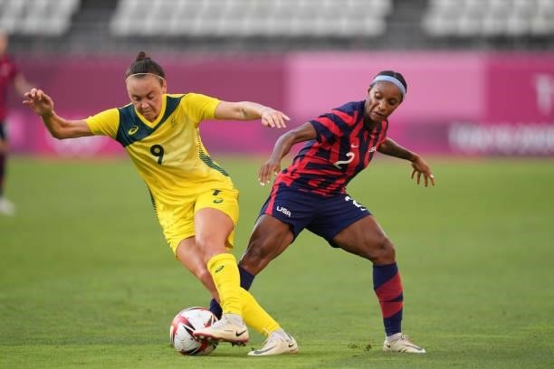 Caitlin Foord of Australia is challenged by Crystal Dunn of the United States during a game between Australia and USWNT at Kashima Soccer Stadium on...