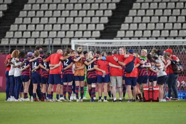 The USWNT huddle during a game between Australia and USWNT at Kashima Soccer Stadium on August 5, 2021 in Kashima, Japan.