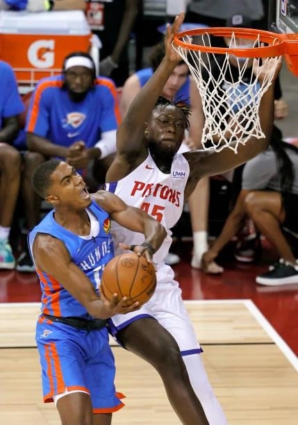 Sekou Doumbouya of the Detroit Pistons fouls Theo Maledon of the Oklahoma City Thunder during the 2021 NBA Summer League at the Thomas & Mack Center...