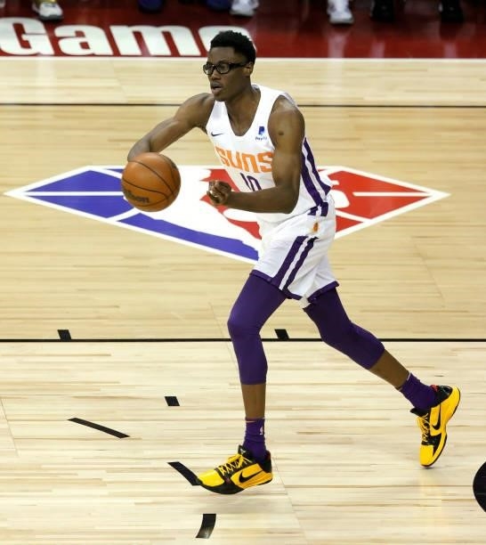 Jalen Smith of the Phoenix Suns passes the ball up the court against the Los Angeles Lakers during the 2021 NBA Summer League at the Thomas & Mack...