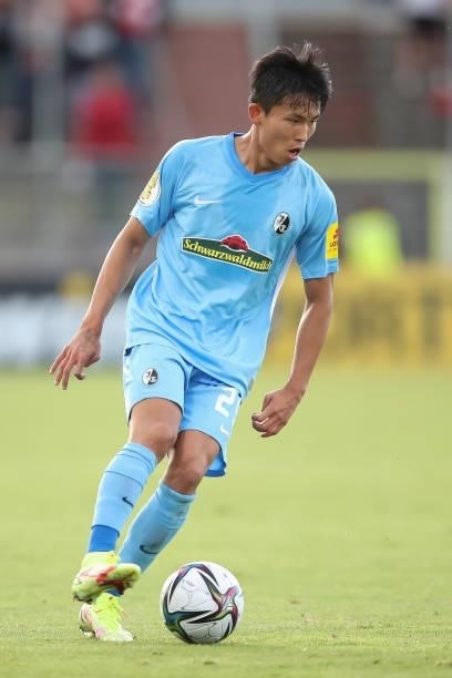 Wooyeong Jeong of SC Freiburg in action during the DFB Cup first round match between Würzburger Kickers and SC Freiburg at Flyeralarm Arena on August...