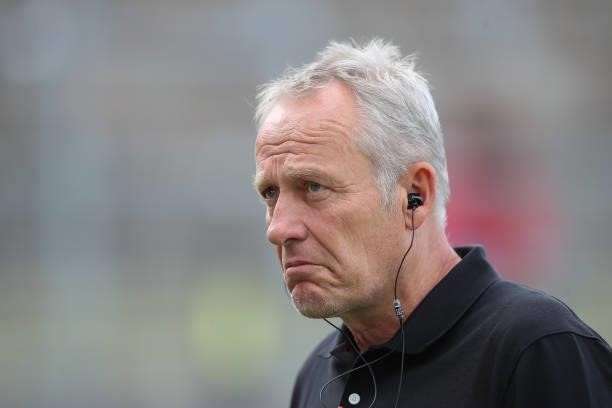 Christian Streich, Head coach of SC Freiburg looks on during the DFB Cup first round match between Würzburger Kickers and SC Freiburg at Flyeralarm...