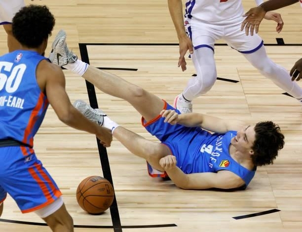 Josh Giddey of the Oklahoma City Thunder injures his ankle as he get tripped up driving against the Detroit Pistons during the 2021 NBA Summer League...