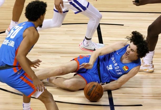 Josh Giddey of the Oklahoma City Thunder injures his ankle as he get tripped up driving against the Detroit Pistons during the 2021 NBA Summer League...