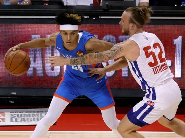 Tre Mann of the Oklahoma City Thunder is guarded by Spencer Littleson of the Detroit Pistons during the 2021 NBA Summer League at the Thomas & Mack...