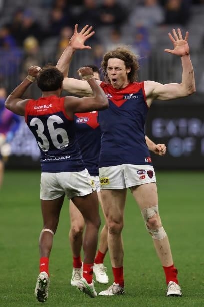 Ben Brown of the Demons celebrates a goal during the round 21 AFL match between West Coast Eagles and Melbourne Demons at Optus Stadium on August 09,...