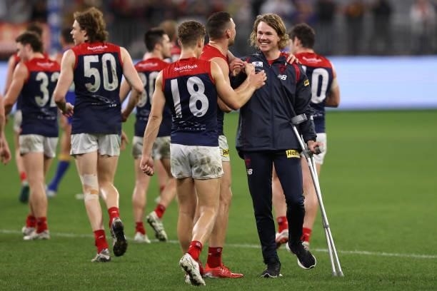 Jayden Hunt of the Demons is seen on crutches after winning the round 21 AFL match between West Coast Eagles and Melbourne Demons at Optus Stadium on...