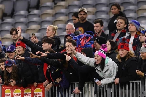 Demons fans call out to players after winning the round 21 AFL match between West Coast Eagles and Melbourne Demons at Optus Stadium on August 09,...