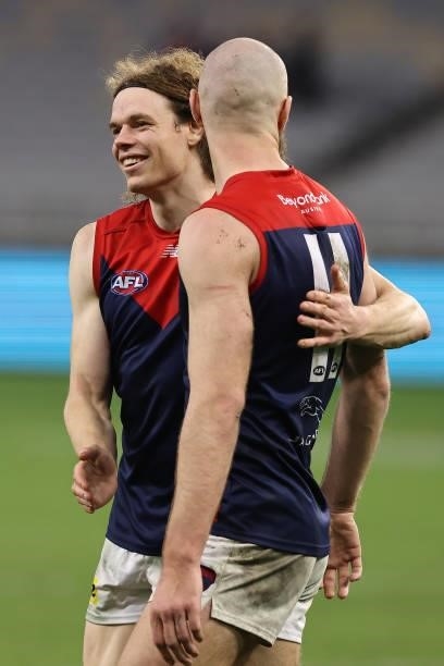 Ben Brown and Max Gawn of the Demons celebrate winning the round 21 AFL match between West Coast Eagles and Melbourne Demons at Optus Stadium on...