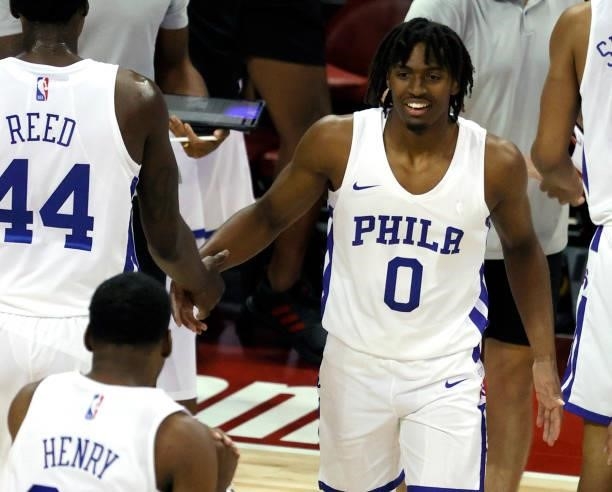 Tyrese Maxey of the Philadelphia 76ers greets teammates on the court during a timeout in their game against the Dallas Mavericks during the 2021 NBA...