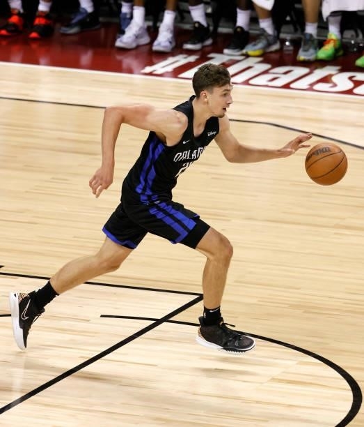 Franz Wagner of the Orlando Magic brings the ball up the court against the Golden State Warriors during the 2021 NBA Summer League at the Thomas &...
