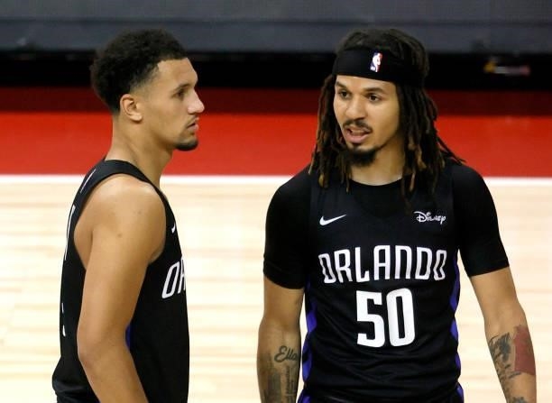 Jalen Suggs and Cole Anthony of the Orlando Magic talk on the court during a break in their game against the Golden State Warriors during the 2021...
