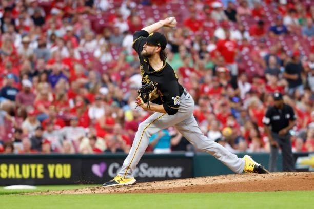 Brubaker of the Pittsburgh Pirates pitches during the game against the Cincinnati Reds at Great American Ball Park on August 6, 2021 in Cincinnati,...