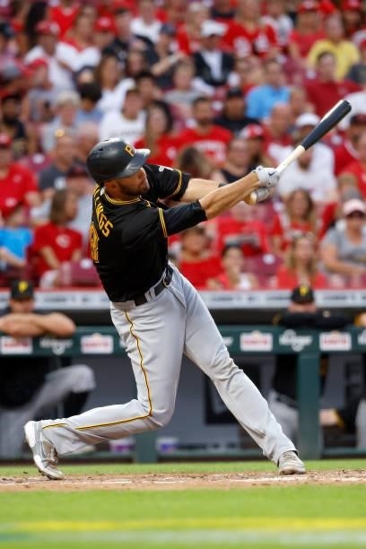 Jacob Stallings of the Pittsburgh Pirates bats during the game against the Cincinnati Reds at Great American Ball Park on August 6, 2021 in...