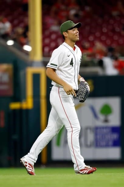 Shogo Akiyama of the Cincinnati Reds jogs off of the field after defeating the Pittsburgh Pirates at Great American Ball Park on August 6, 2021 in...