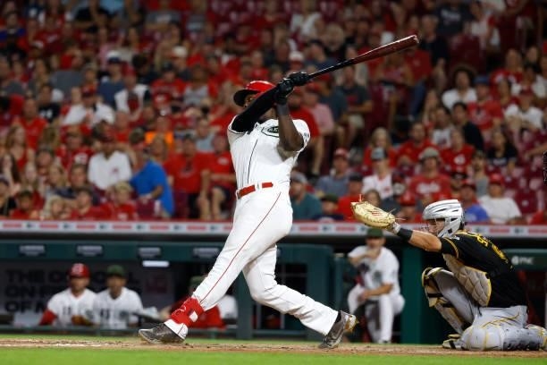 Aristides Aquino of the Cincinnati Reds bats during the game against the Pittsburgh Pirates at Great American Ball Park on August 6, 2021 in...