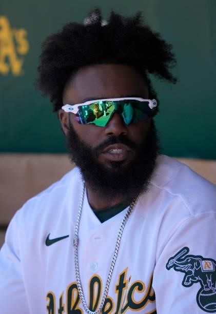 Josh Harrison of the Oakland Athletics looks on from the dugout against the San Diego Padres in the bottom of the first inning at RingCentral...