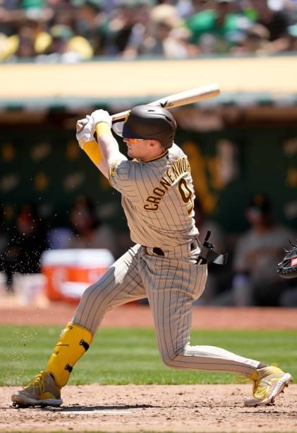 Jake Cronenworth of the San Diego Padres bats against the Oakland Athletics in the top of the fourth inning at RingCentral Coliseum on August 04,...