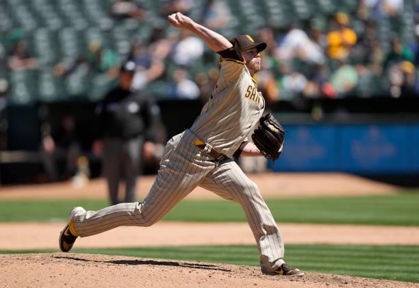 Pierce Johnson of the San Diego Padres pitches against the Oakland Athletics in the bottom of the seventh inning at RingCentral Coliseum on August...