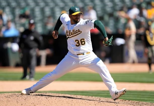 Yusmeiro Petit of the Oakland Athletics pitches against the San Diego Padres in the top of the ninth inning at RingCentral Coliseum on August 04,...