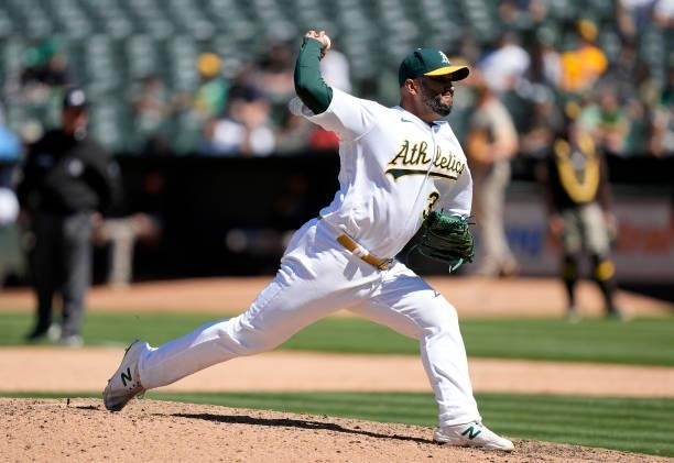 Yusmeiro Petit of the Oakland Athletics pitches against the San Diego Padres in the top of the ninth inning at RingCentral Coliseum on August 04,...