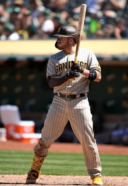 Victor Caratini of the San Diego Padres bats against the Oakland Athletics in the top of the ninth inning at RingCentral Coliseum on August 04, 2021...