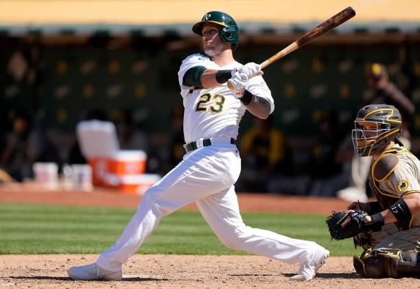 Yan Gomes of the Oakland Athletics bats against the San Diego Padres in the bottom of the ninth inning at RingCentral Coliseum on August 04, 2021 in...