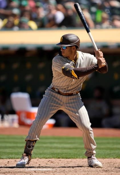 Trent Grisham of the San Diego Padres bats against the Oakland Athletics in the top of the ninth inning at RingCentral Coliseum on August 04, 2021 in...