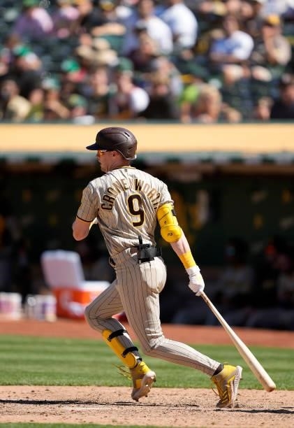 Jake Cronenworth of the San Diego Padres bats against the Oakland Athletics in the top of the tenth inning at RingCentral Coliseum on August 04, 2021...