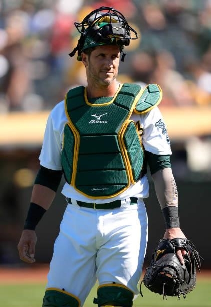 Yan Gomes of the Oakland Athletics looks on walking back to the dugout against the San Diego Padres in the top of the tenth inning at RingCentral...