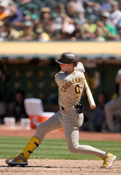 Jake Cronenworth of the San Diego Padres bats against the Oakland Athletics in the top of the eighth inning at RingCentral Coliseum on August 04,...