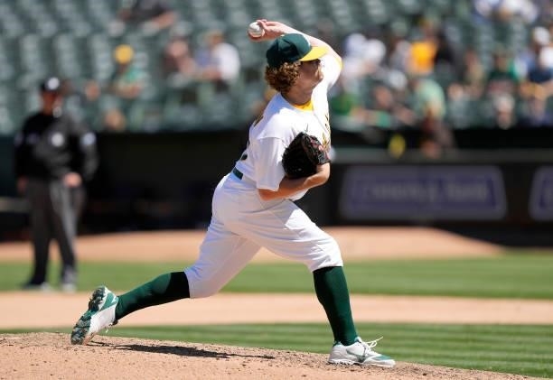 Andrew Chafin of the Oakland Athletics pitches against the San Diego Padres in the top of the seventh inning at RingCentral Coliseum on August 04,...