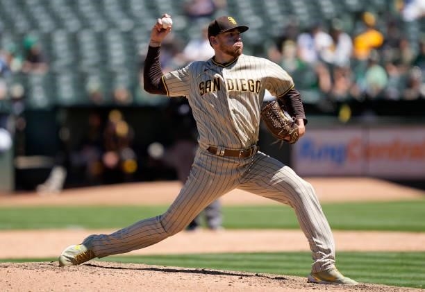 Joe Musgrove of the San Diego Padres pitches against the Oakland Athletics in the bottom of the six inning at RingCentral Coliseum on August 04, 2021...