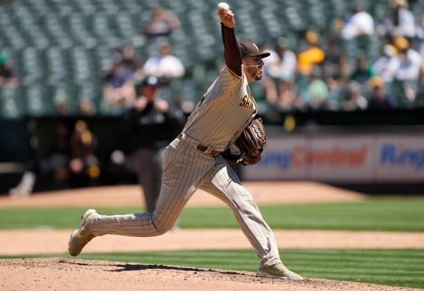 Joe Musgrove of the San Diego Padres pitches against the Oakland Athletics in the bottom of the six inning at RingCentral Coliseum on August 04, 2021...