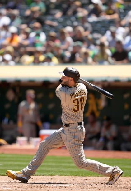 Eric Hosmer of the San Diego Padres bats against the Oakland Athletics in the top of the fourth inning at RingCentral Coliseum on August 04, 2021 in...