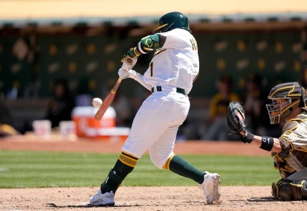Josh Harrison of the Oakland Athletics bats against the San Diego Padres in the bottom of the six inning at RingCentral Coliseum on August 04, 2021...