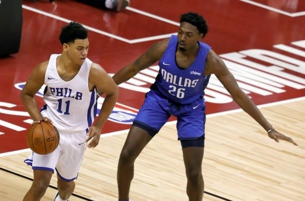 Jaden Springer of the Philadelphia 76ers is guarded by Robert Franks of the Dallas Mavericks during the 2021 NBA Summer League at the Thomas & Mack...