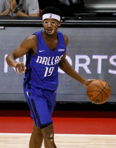 Devontae Shuler of the Dallas Mavericks sets up a play against the Philadelphia 76ers during the 2021 NBA Summer League at the Thomas & Mack Center...