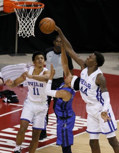 Paul Reed of the Philadelphia 76ers blocks a shot by Tyrell Terry of the Dallas Mavericks as Jaden Springer of the 76ers defends during the 2021 NBA...