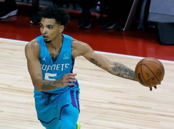 James Bouknight of the Charlotte Hornets looks to pass against the Sacramento Kings during the 2021 NBA Summer League at the Thomas & Mack Center on...