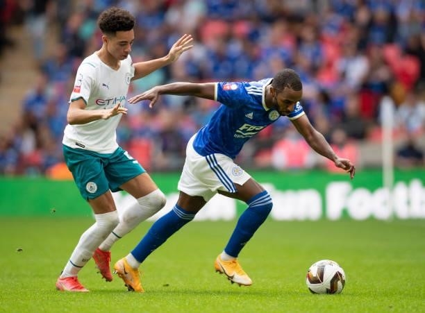 Ricardo Domingos Barbosa Pereira of Leicester City and Samuel Edozie of Manchester City during the The FA Community Shield between Manchester City...