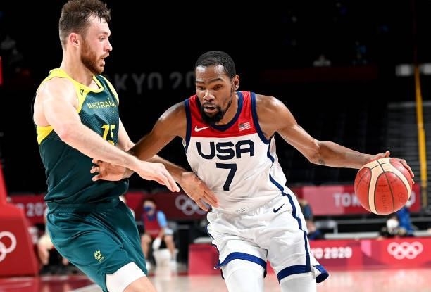 Kevin Durant of the USA takes on the defence of Nic Kay of Australia during the Basketball semi final match between Australia and the USA on day...