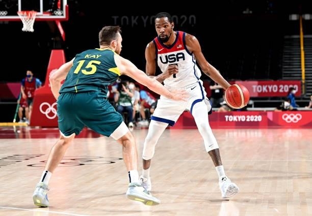 Kevin Durant of the USA takes on the defence of Nic Kay of Australia during the Basketball semi final match between Australia and the USA on day...