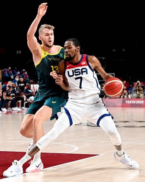 Kevin Durant of the USA takes on the defence of Jock Landale of Australia during the Basketball semi final match between Australia and the USA on day...